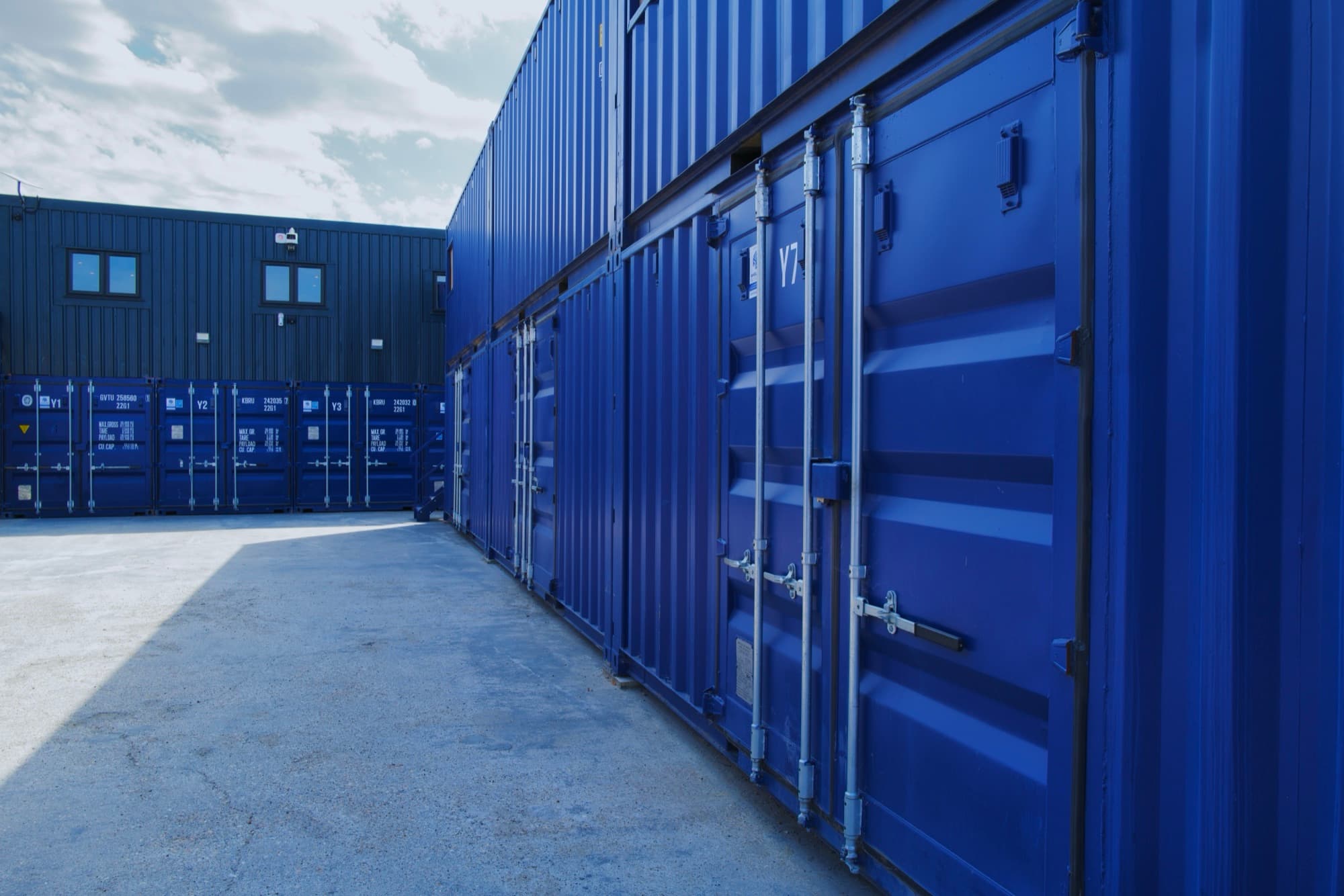 Row of secure storage containers for personal storage